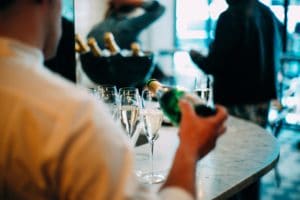pouring a drink in Brighton, wine bar