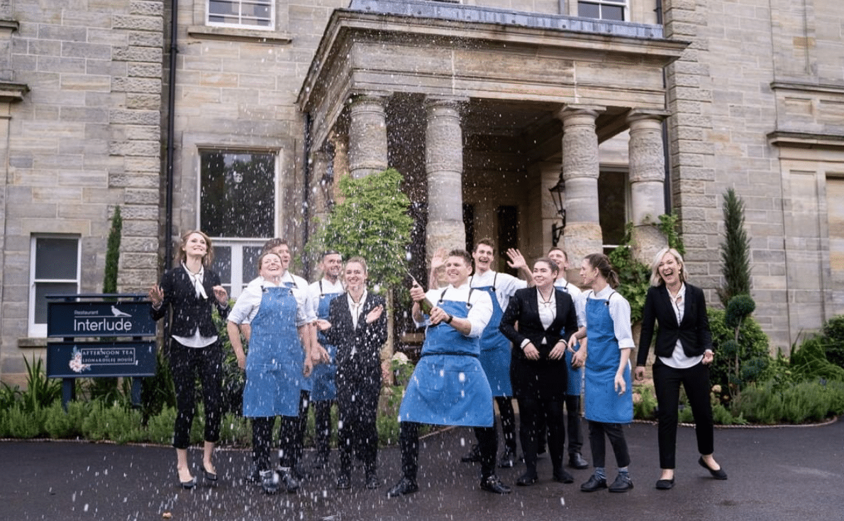 Team shot - Restaurant interlude, Jean Delport. Receiving news of their Michelin star.