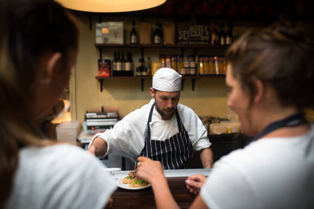 Two waitresses and a chef