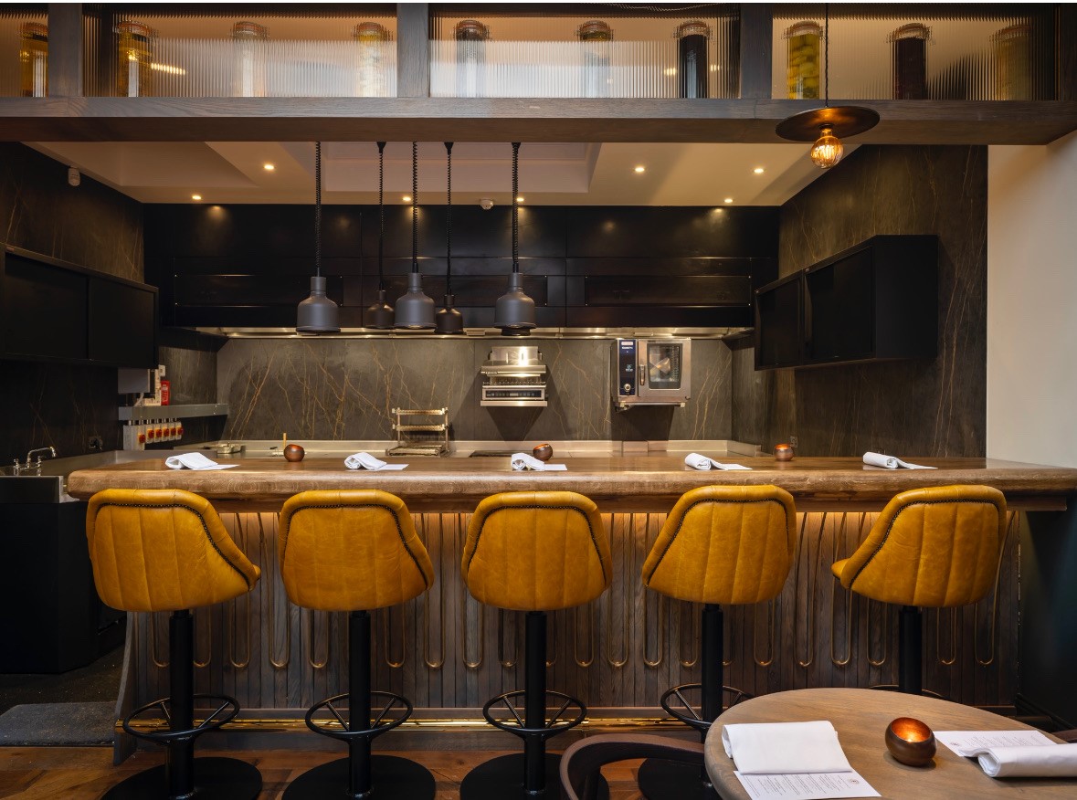 Furna restaurant, with yellow bar seats, located on New Road in brighton 