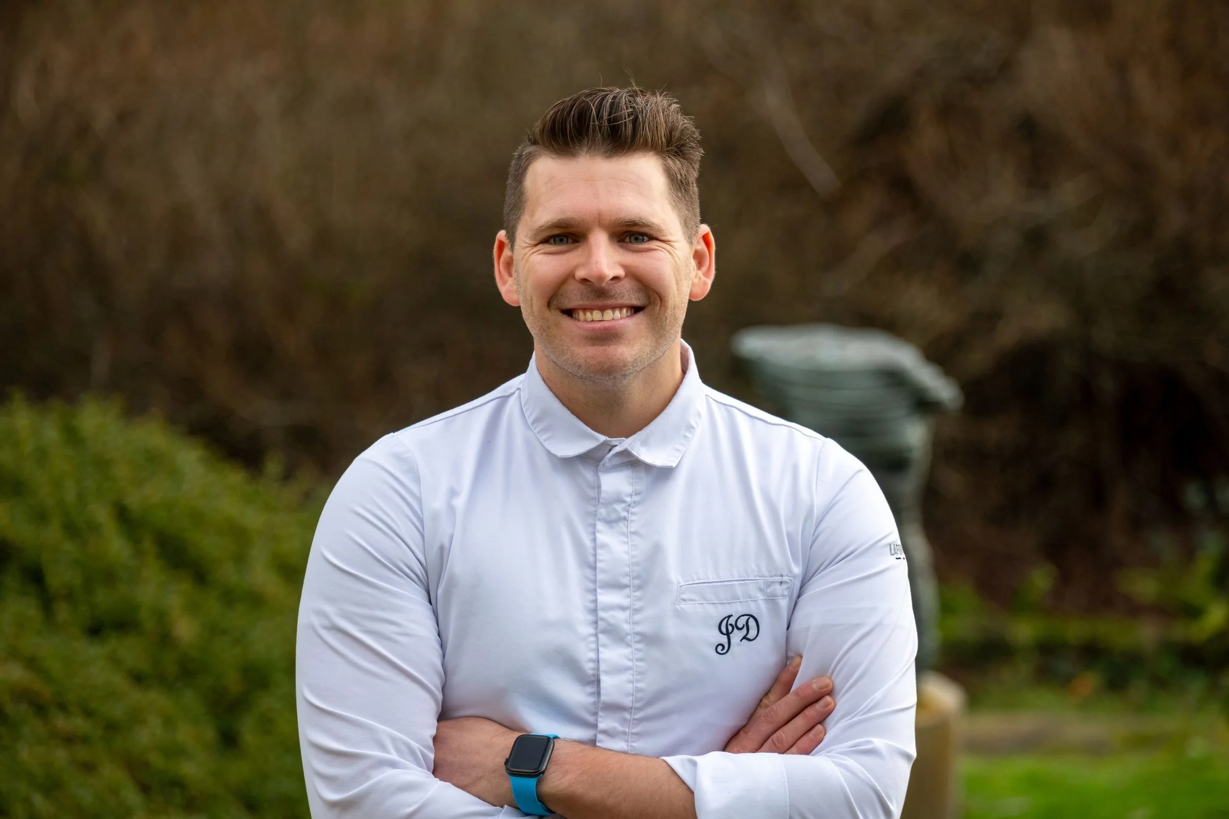 Jean Delport - Restaurant Interlude - stood in garden