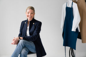 Claudia at Wear Shift, dressed with a blue jacket