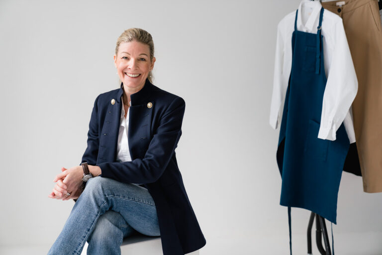 Claudia at Wear Shift, dressed with a blue jacket