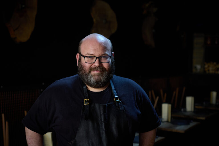 Dave Marrow, Head Chef at Embers, with black backdrop