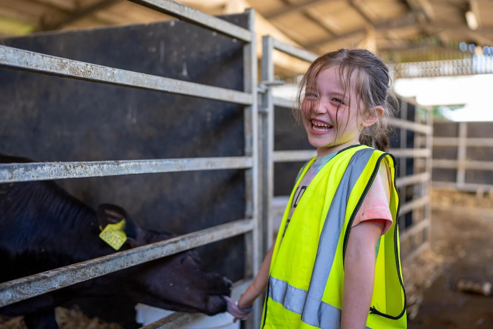 Prept Foundation image - girl at farm with yellow jacket