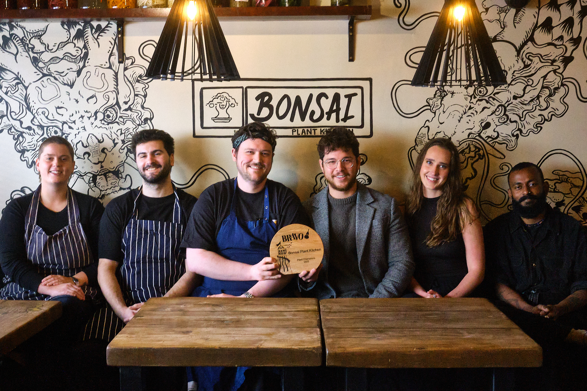 Team from Bonsai Plant Kitchen celebrating winning Best Vegan Restaurant at the BRAVO 2025 Awards in Brighton