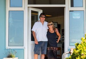 Poul Jnesen and partner stood outside the cafe at Roedean