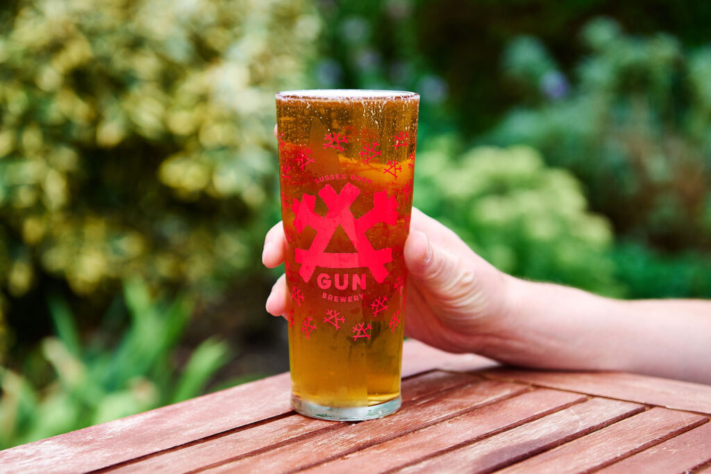 A pint of beer in the garden at Sussex countryside pub.