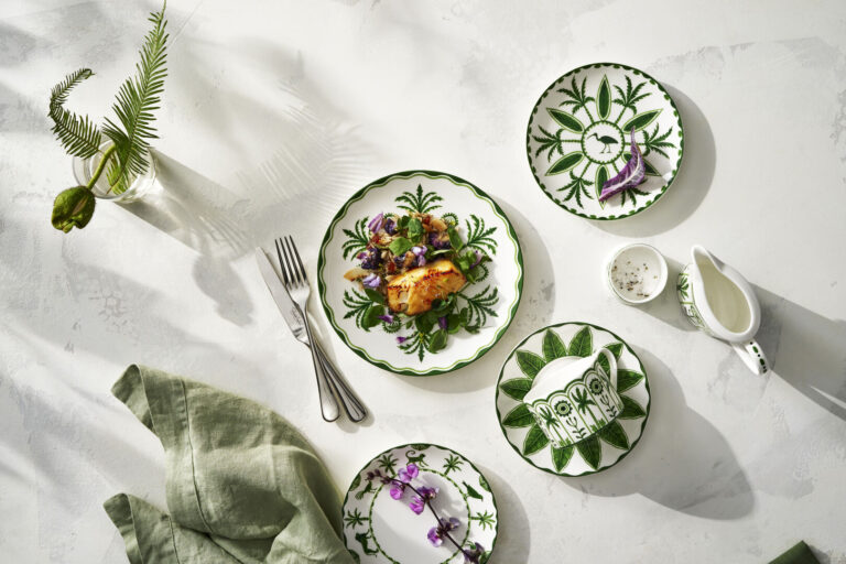 Maximalist and Whimsical crockery by Alliance South East. white and green plates on a white table cloth