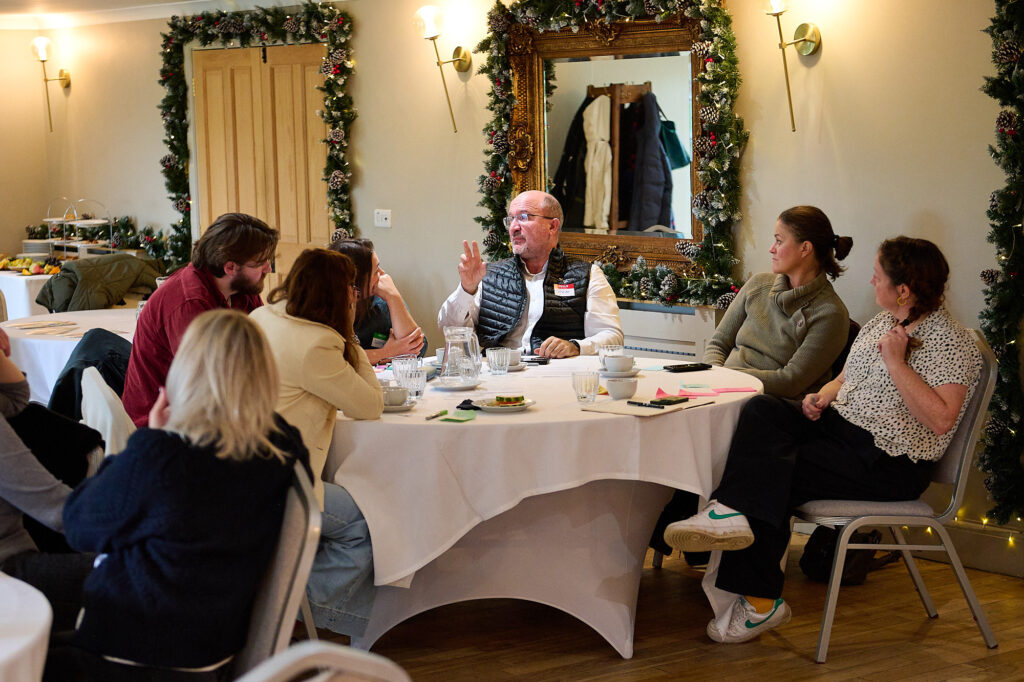 people sitting round a table