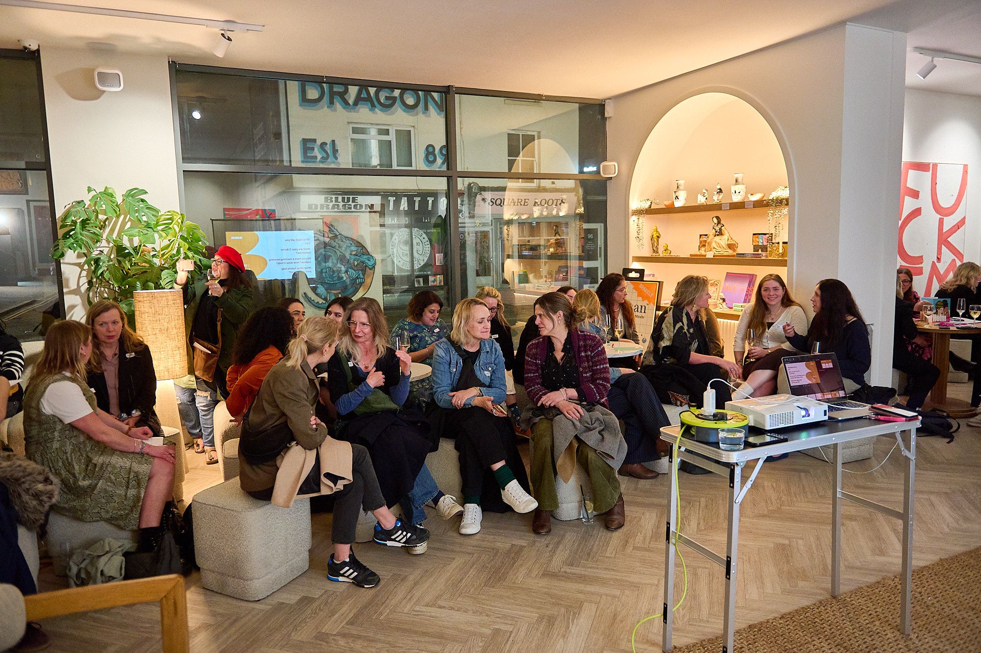 Women in hospitality event, lots of women sitting and waiting for the event to start