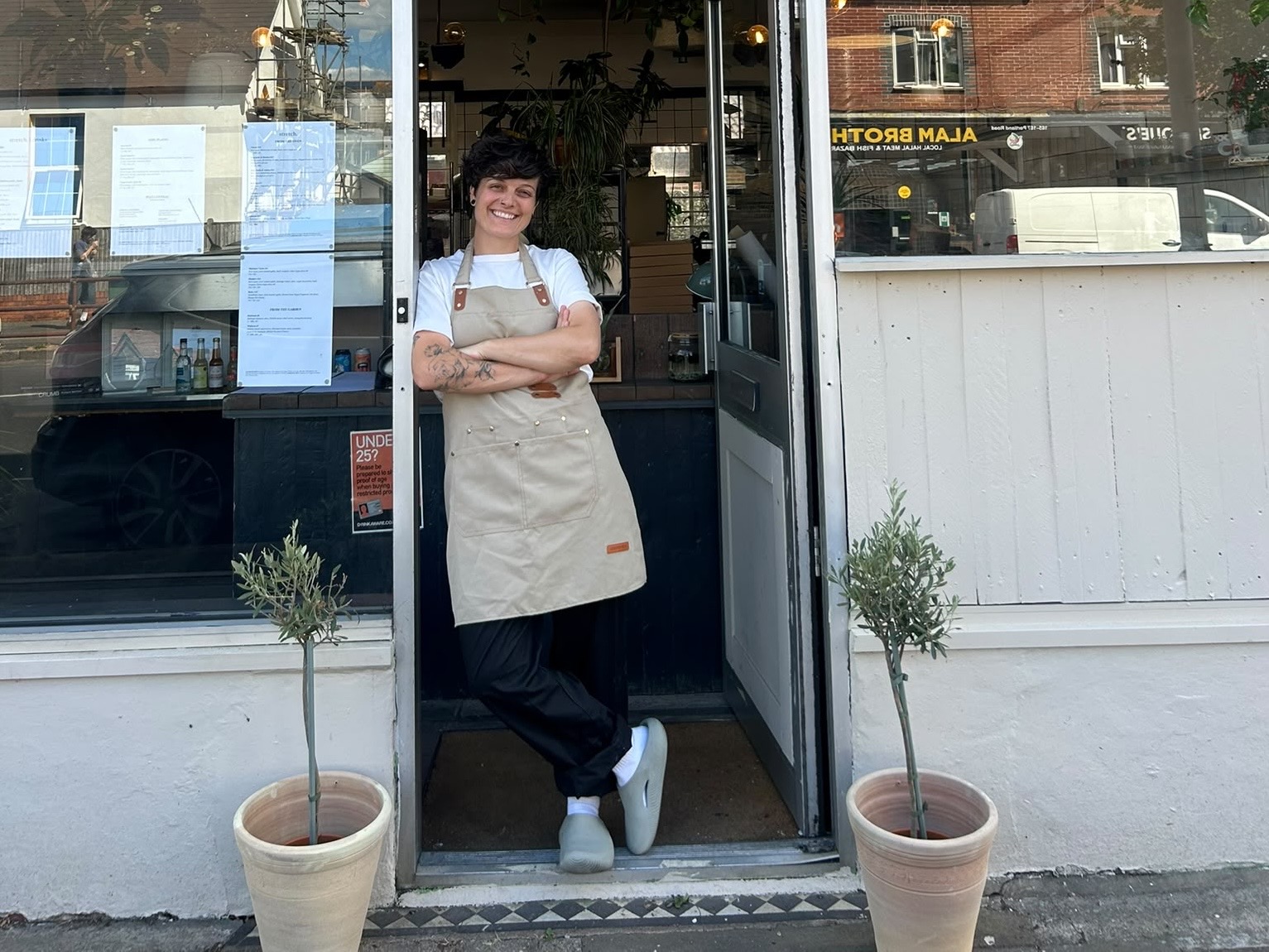 Brigi Stamber - stood outside shop front at Stretch on Portland Road