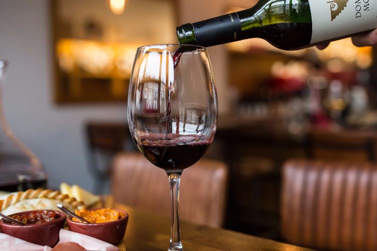 Wine being poured at Cafe Malbec