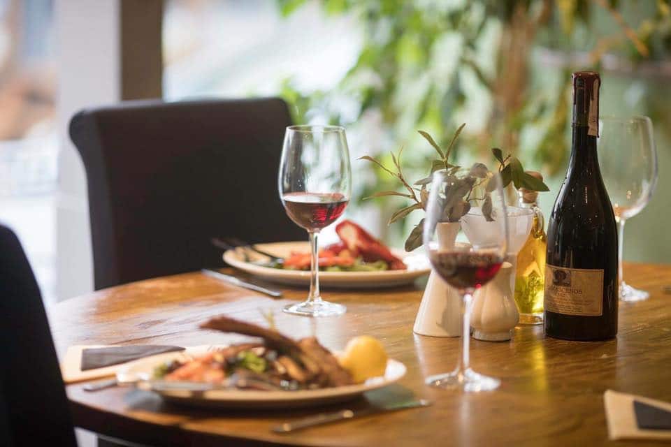 A set table at Adelfia Brighton