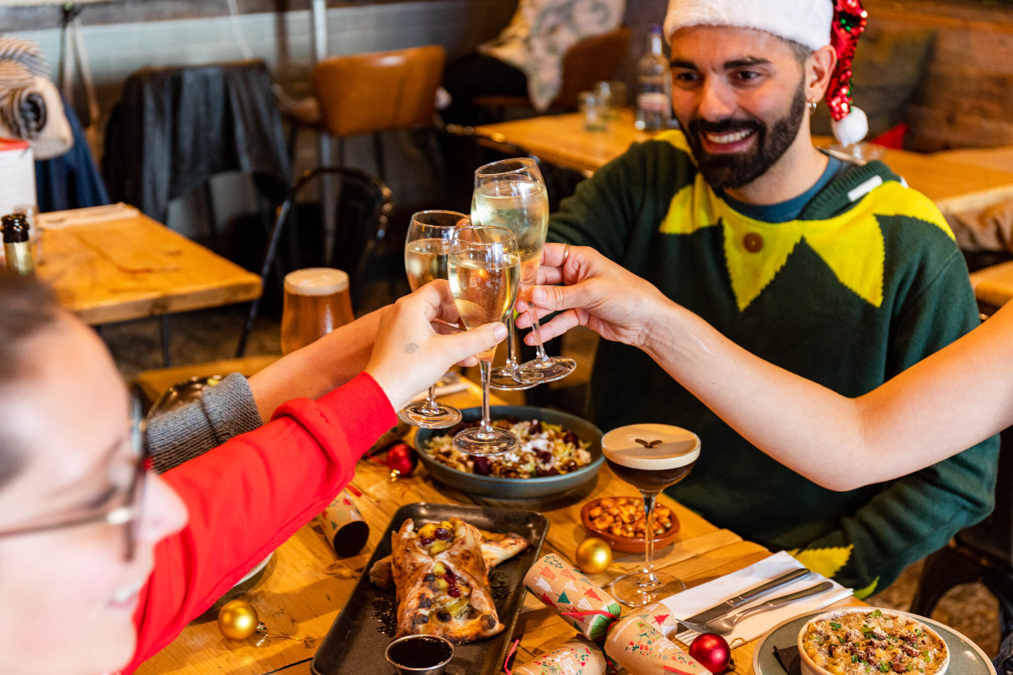 friend group having a festive lunch at Purezza