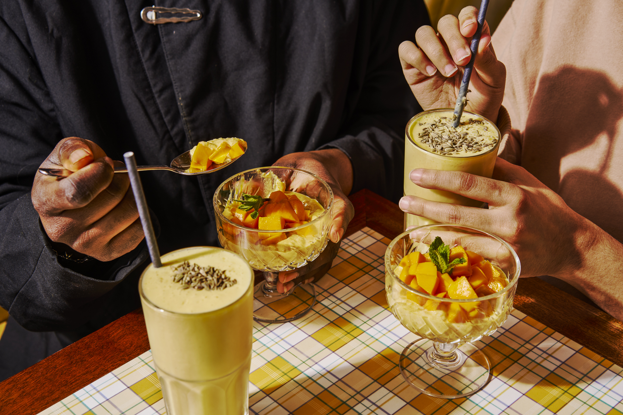 two people enjoying dessert and smoothie at the Permit Room