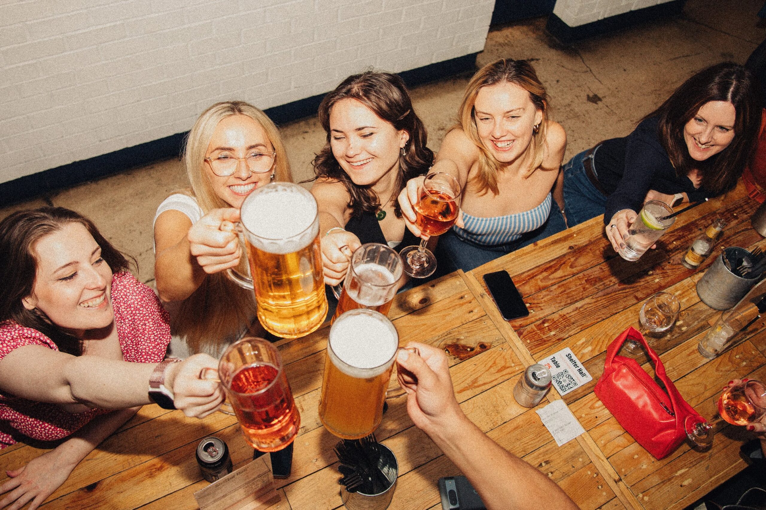 group of girls having beer and fun
